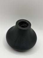 Black textured ceramic vase top with open mouth and ridged surface detail