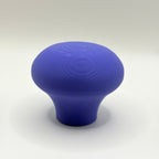 A single mushroom-shaped blue product, likely a 3D-printed knob or handle, centered on a light gray studio background.