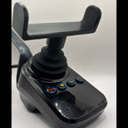 A black plastic joystick control module with a mounting bracket on top and four blue-rimmed buttons on the front face, photographed against a plain light background.